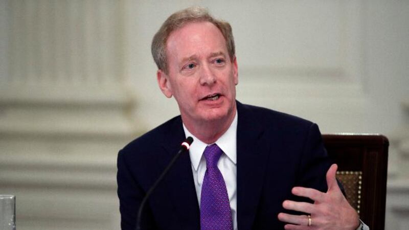 FILE - In this May 29, 2020 file photo, Brad Smith, president of Microsoft, speaks during a...