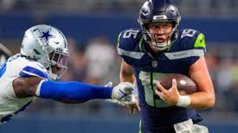 Holton Ahlers runs for the Seattle Seahawks in NFL preseason game against Dallas.
