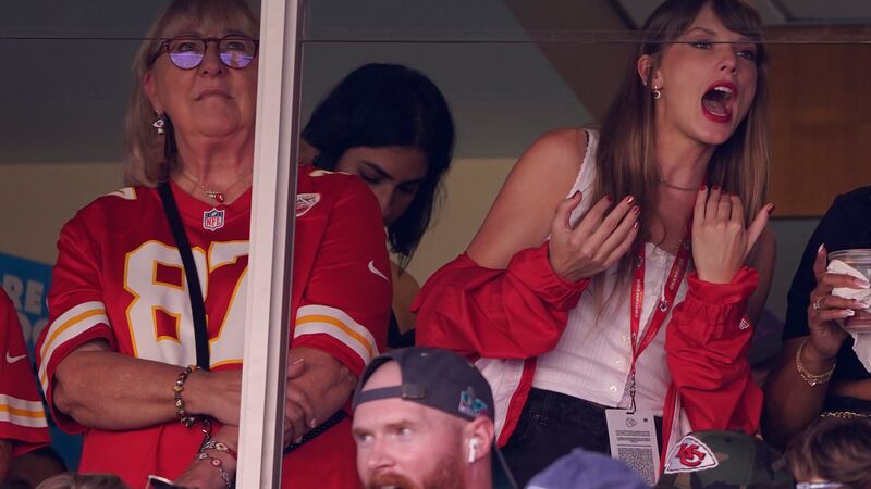 Taylor Swift, right, watches from a suite alongside Travis Kelce's mother, Donna Kelce, inside...