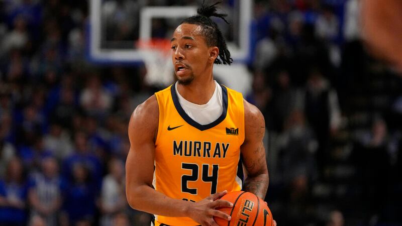 Murray State's JaCobi Wood looks to pass during the first half of an NCAA college basketball...