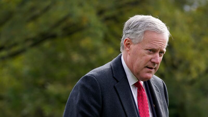 White House chief of staff Mark Meadows walks on the South Lawn of the White House in...