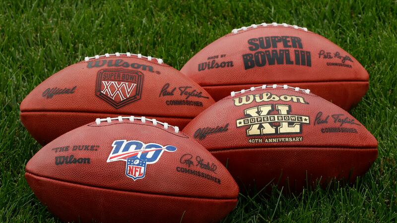 In this Oct. 17, 2019, photo footballs are displayed at the Philadelphia Eagles's NFL football...
